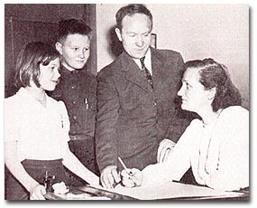 photo Cecilia Payne-Gaposchkin in her office (1946),
with Sergei Gaposchkin, and their two children, Katherine and Edward